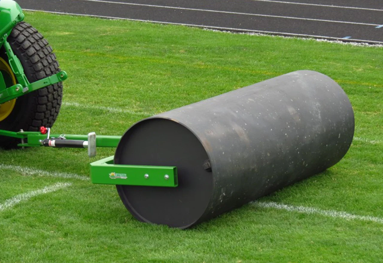 Rolling your lawn to fix large bumps